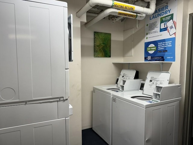 laundry area featuring washing machine and clothes dryer