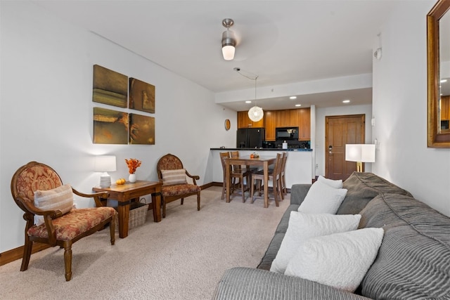 living room with light carpet and ceiling fan