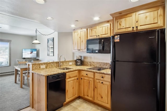 kitchen with black appliances, sink, light stone counters, kitchen peninsula, and light carpet