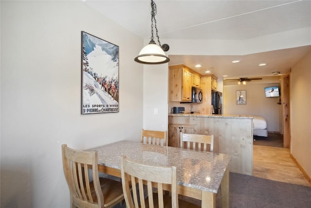 dining area with ceiling fan