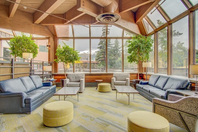 sunroom featuring lofted ceiling with beams and wooden ceiling