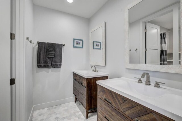 bathroom with a shower with curtain and vanity