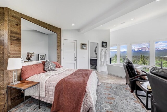 bedroom featuring beam ceiling