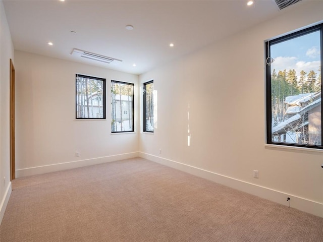 view of carpeted spare room