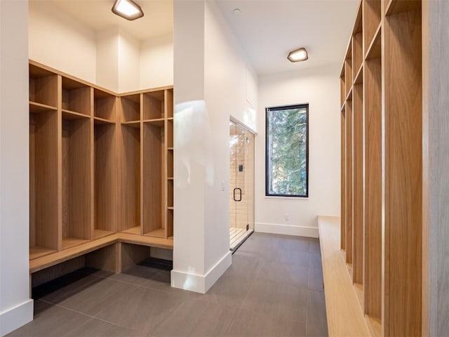 mudroom with tile patterned floors