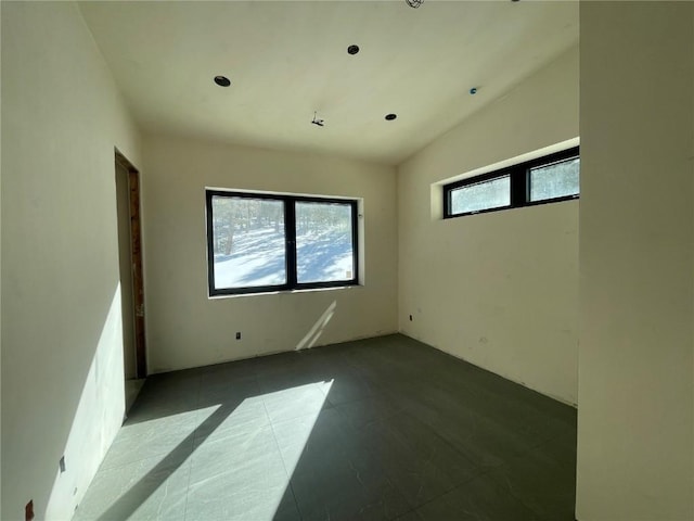 unfurnished room featuring a healthy amount of sunlight