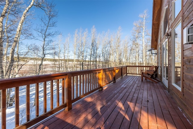 view of snow covered deck