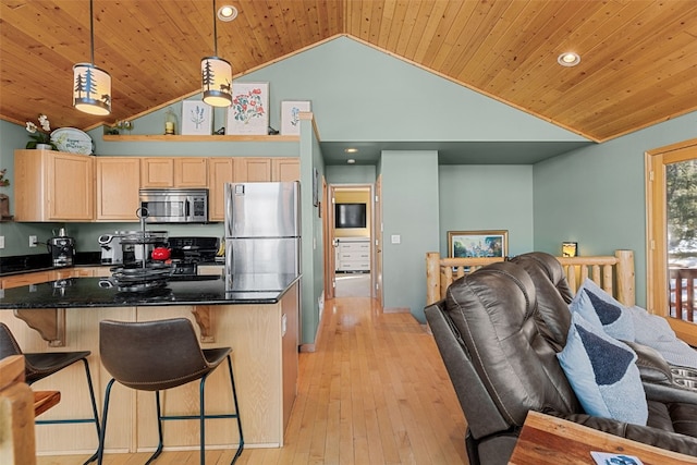 kitchen with light brown cabinets, stainless steel appliances, pendant lighting, light hardwood / wood-style floors, and wood ceiling