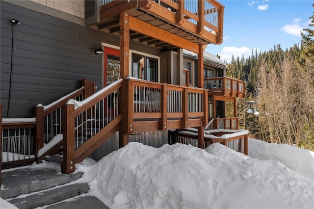 view of snow covered deck