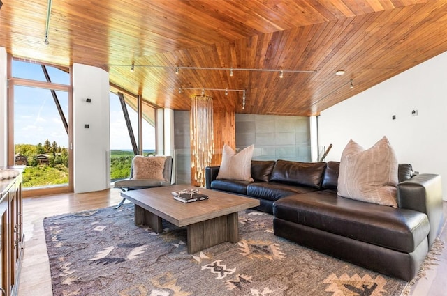 living room featuring floor to ceiling windows and wooden ceiling