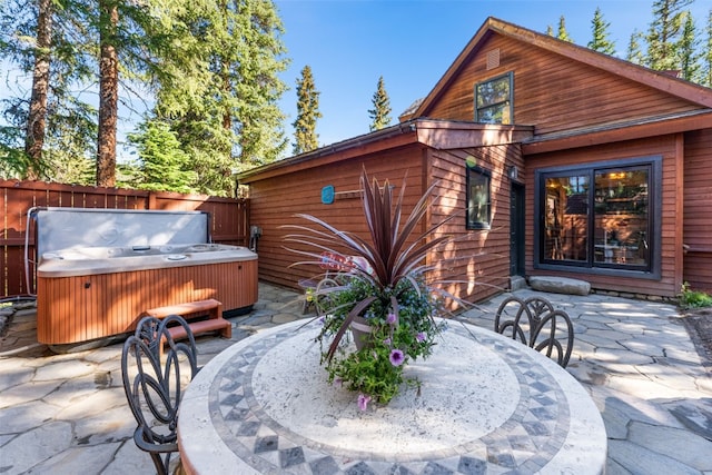 view of patio featuring a hot tub