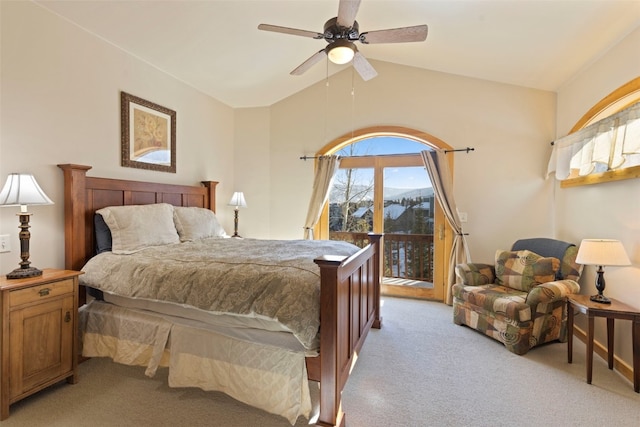 carpeted bedroom featuring lofted ceiling, access to outside, and ceiling fan