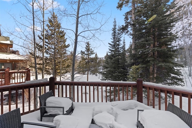 view of snow covered deck