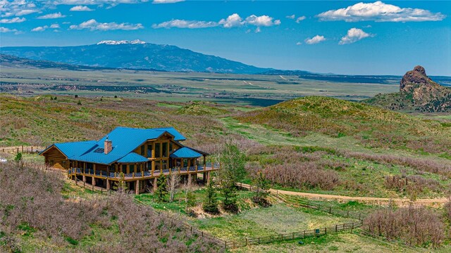 view of mountain feature with a rural view