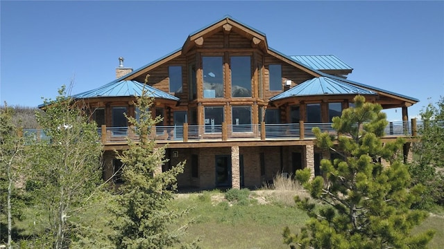 rear view of house with a gazebo