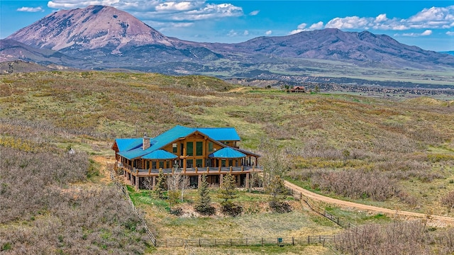 view of mountain feature with a rural view