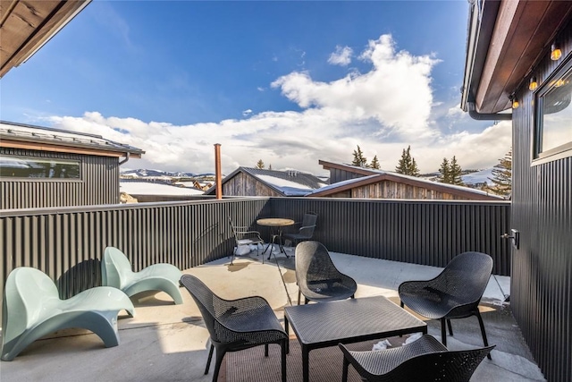 view of patio / terrace with a balcony