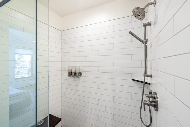 bathroom featuring a shower stall