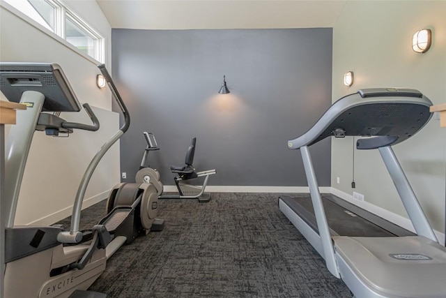 workout area with carpet and baseboards