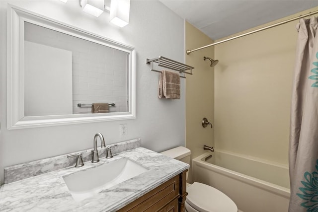 full bathroom featuring toilet, vanity, and shower / bath combo