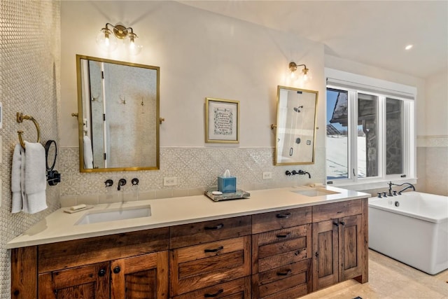 bathroom featuring vanity, a bathing tub, and tile walls