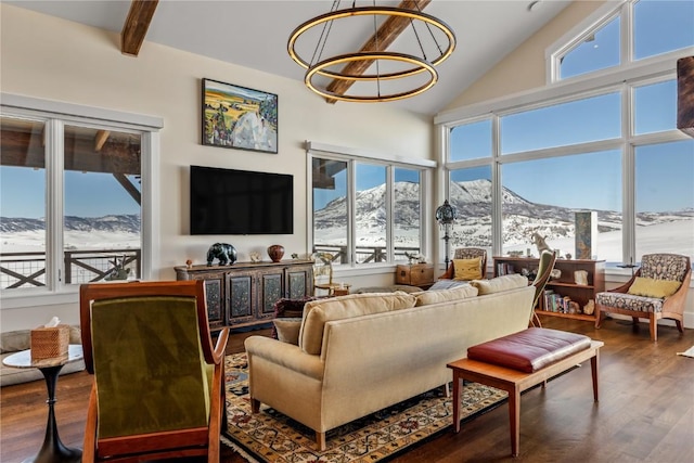 living room featuring dark hardwood / wood-style flooring, high vaulted ceiling, and beam ceiling