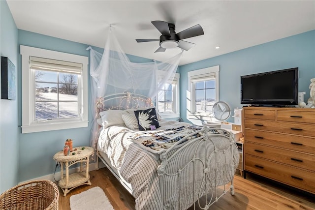 bedroom featuring dark wood-type flooring and ceiling fan