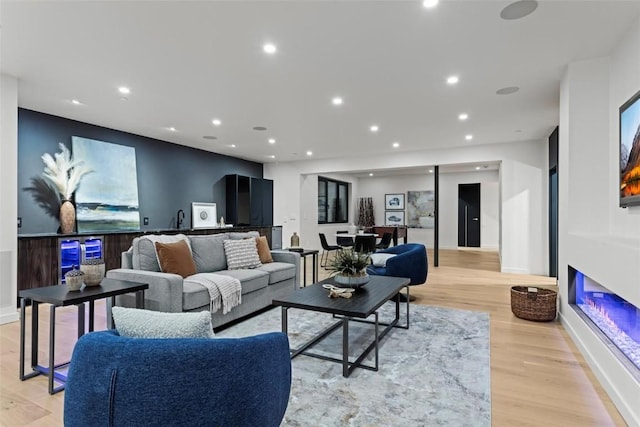 living room with light hardwood / wood-style floors