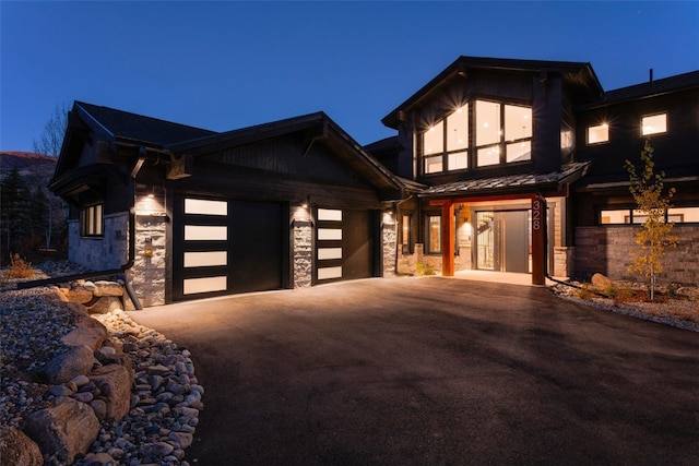 craftsman-style home with a garage