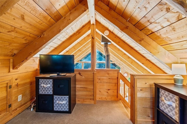 bonus room featuring wood ceiling, wood walls, carpet floors, and lofted ceiling with beams