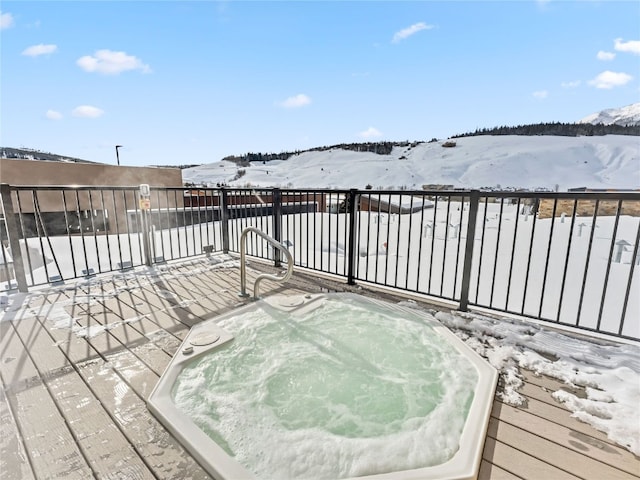 view of snow covered deck