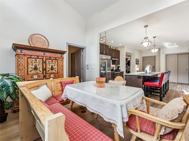 dining space featuring dark hardwood / wood-style floors