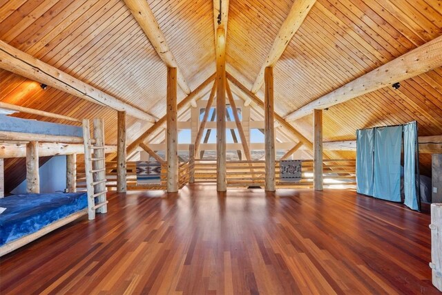 full bath featuring beam ceiling, wood walls, vanity, and toilet