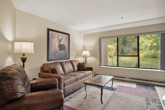 living room featuring a textured ceiling and a baseboard radiator