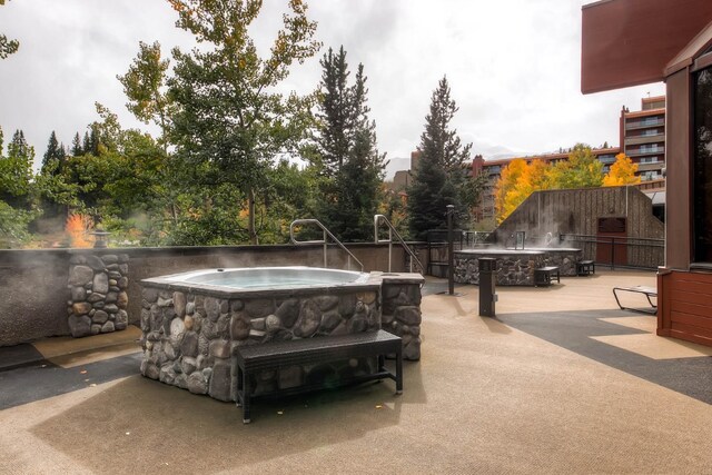 view of patio featuring a hot tub