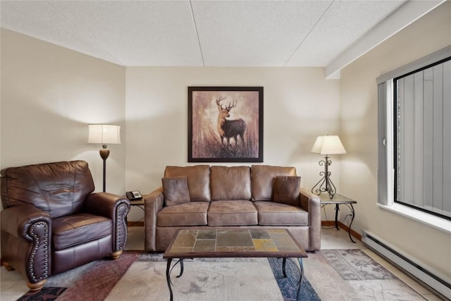 living room featuring a textured ceiling and a baseboard radiator