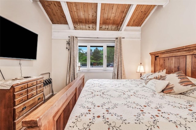 bedroom with beam ceiling and wooden ceiling