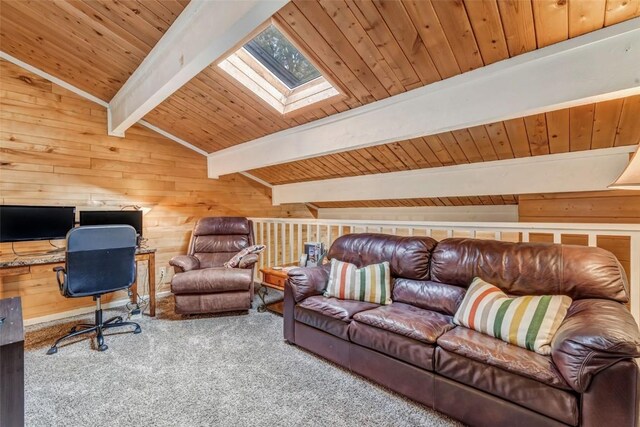 office area featuring wood walls, vaulted ceiling with skylight, carpet floors, and wooden ceiling