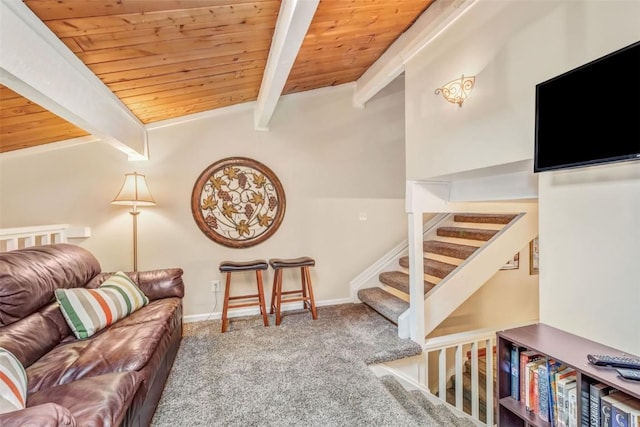 carpeted living room featuring vaulted ceiling with beams and wood ceiling