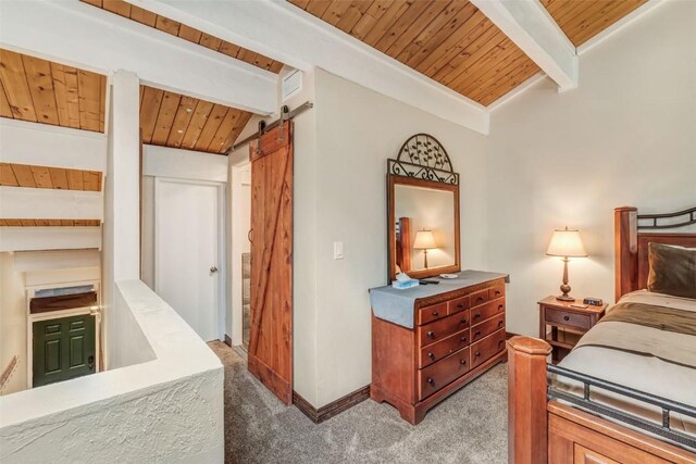 bedroom featuring carpet flooring, vaulted ceiling with beams, a barn door, and wood ceiling