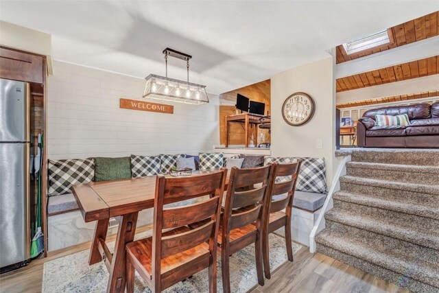 dining room with light wood-type flooring