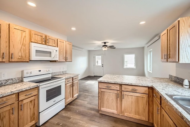 525 Castello Ave, Fairplay, CO 80440 - kitchen with a sink, white appliances, ceiling fan, a peninsula, and dark wood-style flooring