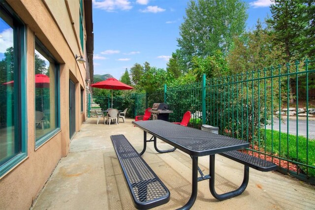 23110 US Highway 6 Unit 5056, Keystone, CO 80435 - view of patio with outdoor dining space, area for grilling, and fence