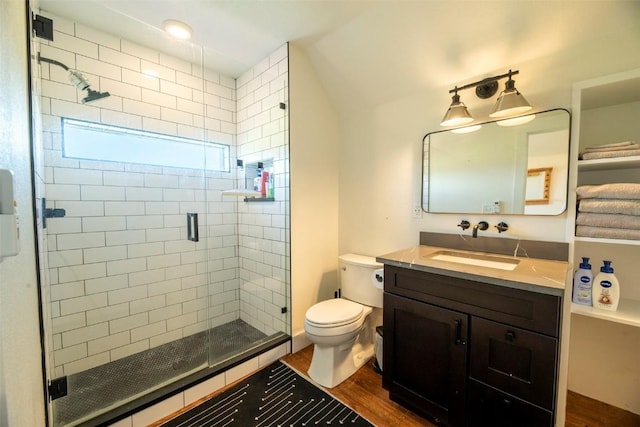 44255 Diamondback Way, Steamboat Springs, CO 80487 - bathroom with vanity, wood finished floors, and a shower stall