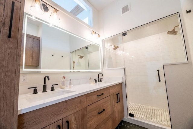 44255 Diamondback Way, Steamboat Springs, CO 80487 - bathroom featuring a stall shower and double vanity