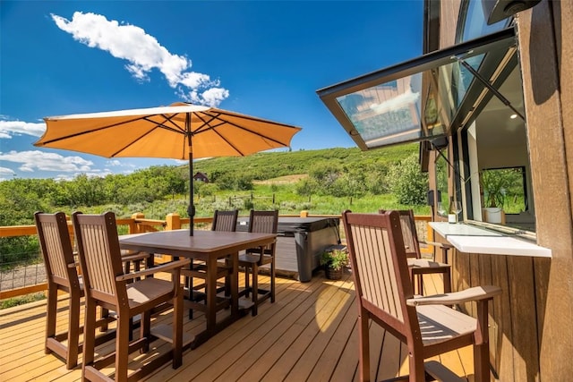 44255 Diamondback Way, Steamboat Springs, CO 80487 - wooden terrace with outdoor dining space