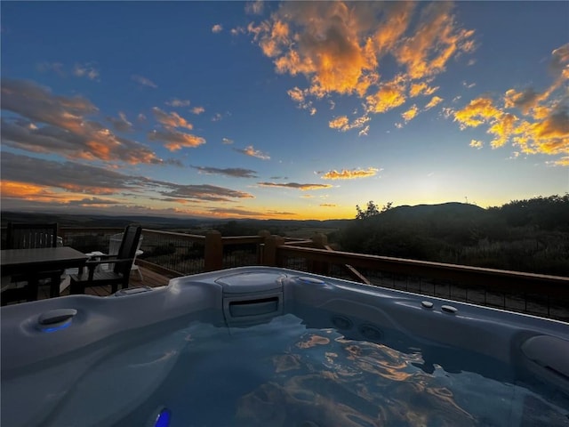 44255 Diamondback Way, Steamboat Springs, CO 80487 - pool at dusk with a mountain view