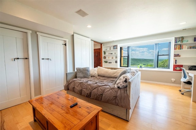 44255 Diamondback Way, Steamboat Springs, CO 80487 - living room featuring light wood-type flooring, a desk, and recessed lighting