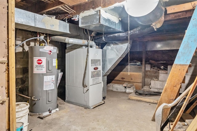 utility room with water heater and heating unit