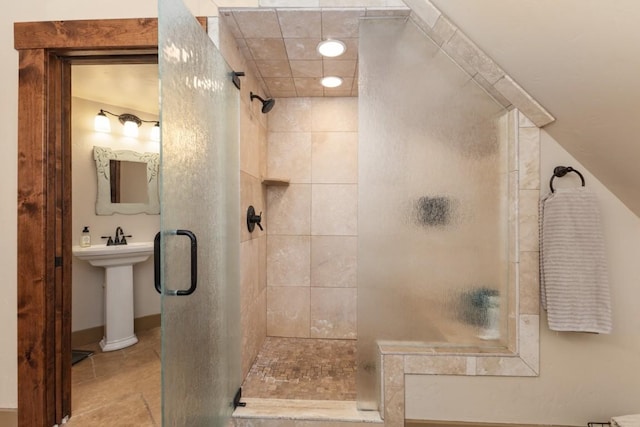 40924 Purple Sage St, Steamboat Springs, CO 80487 - full bathroom with a stall shower, baseboards, and a sink